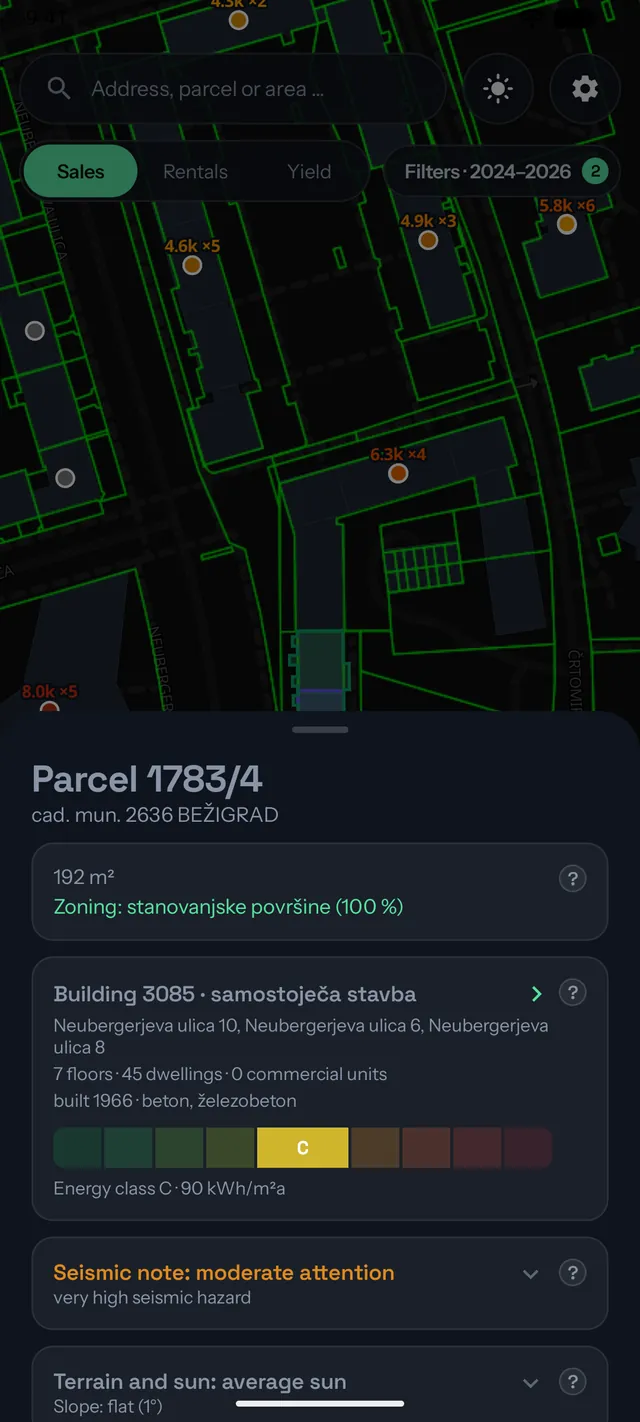 Tapping a building on the map opens its parcel, zoning, energy, seismic and terrain summary