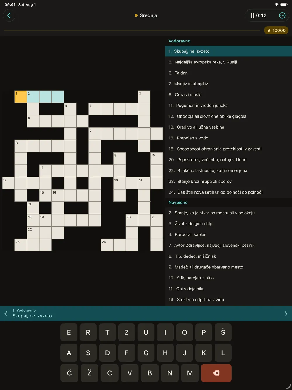 A crossword on iPad with the grid on the left, the full clue lists on the right and the keyboard below