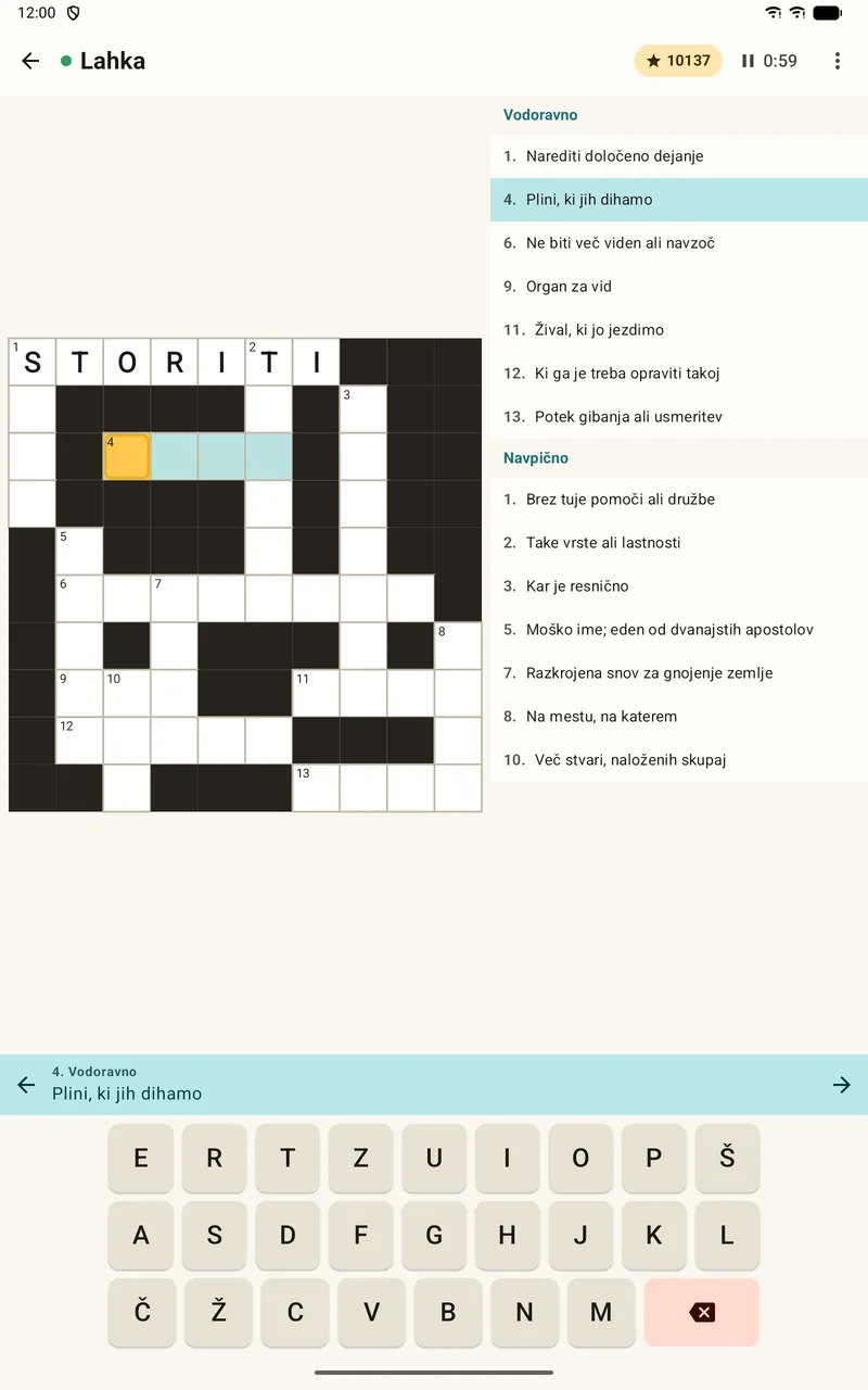 Solving a crossword on a tablet with the grid and keyboard at a comfortable width