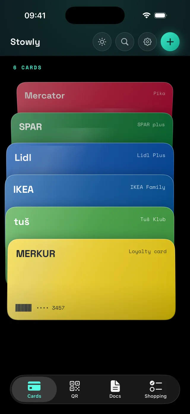 The Stowly card wallet on iPhone with a stack of colour-matched loyalty cards